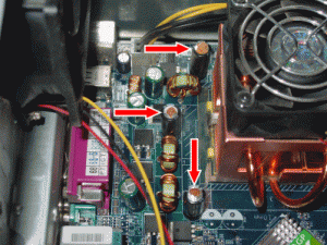 Leaking and bulging motherboard capacitors around processor.